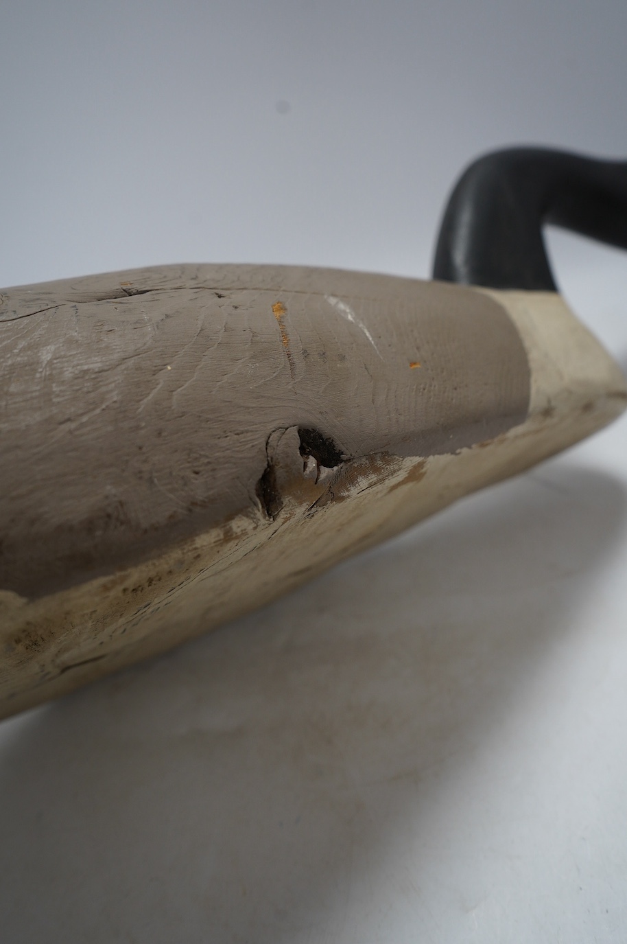 A vintage carved and painted wood decoy goose, 80cm in length. Condition - fair